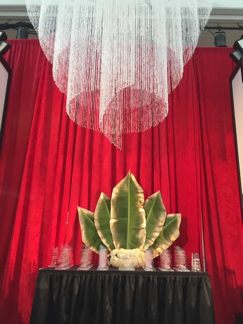 Leaf Decor With Red Curtains
